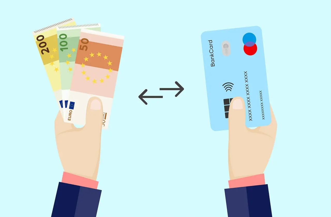Payment cards arranged on a dark background illustrating crypto debit card options