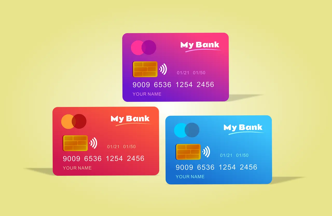 A fan of contactless payment cards on a dark surface